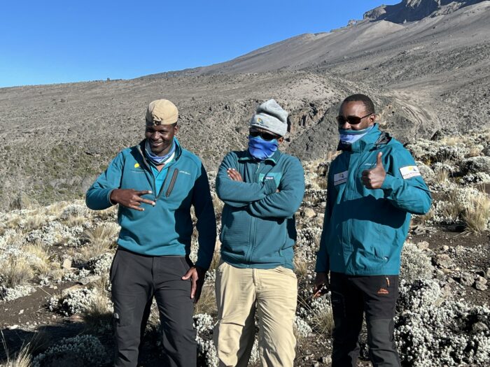 Mountain guides on Mt. Kilimanjaro looking happy.