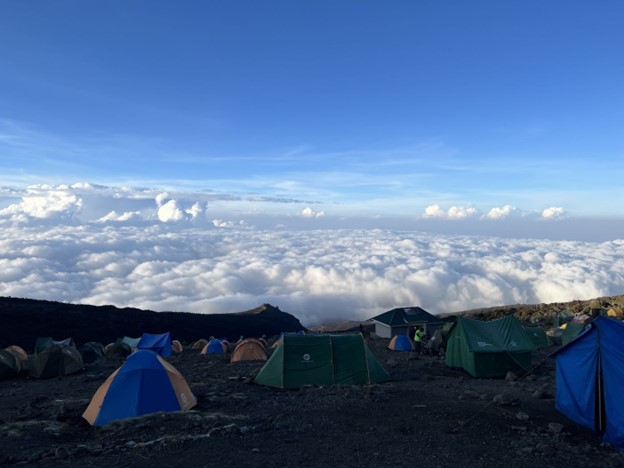 Alpine desert zone on Mount Kilimanjaro. View from camp above the clouds.